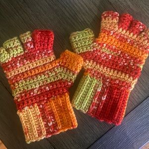 The cutest knitted fingerless gloves. Orange red green. In perfect condition.🎄